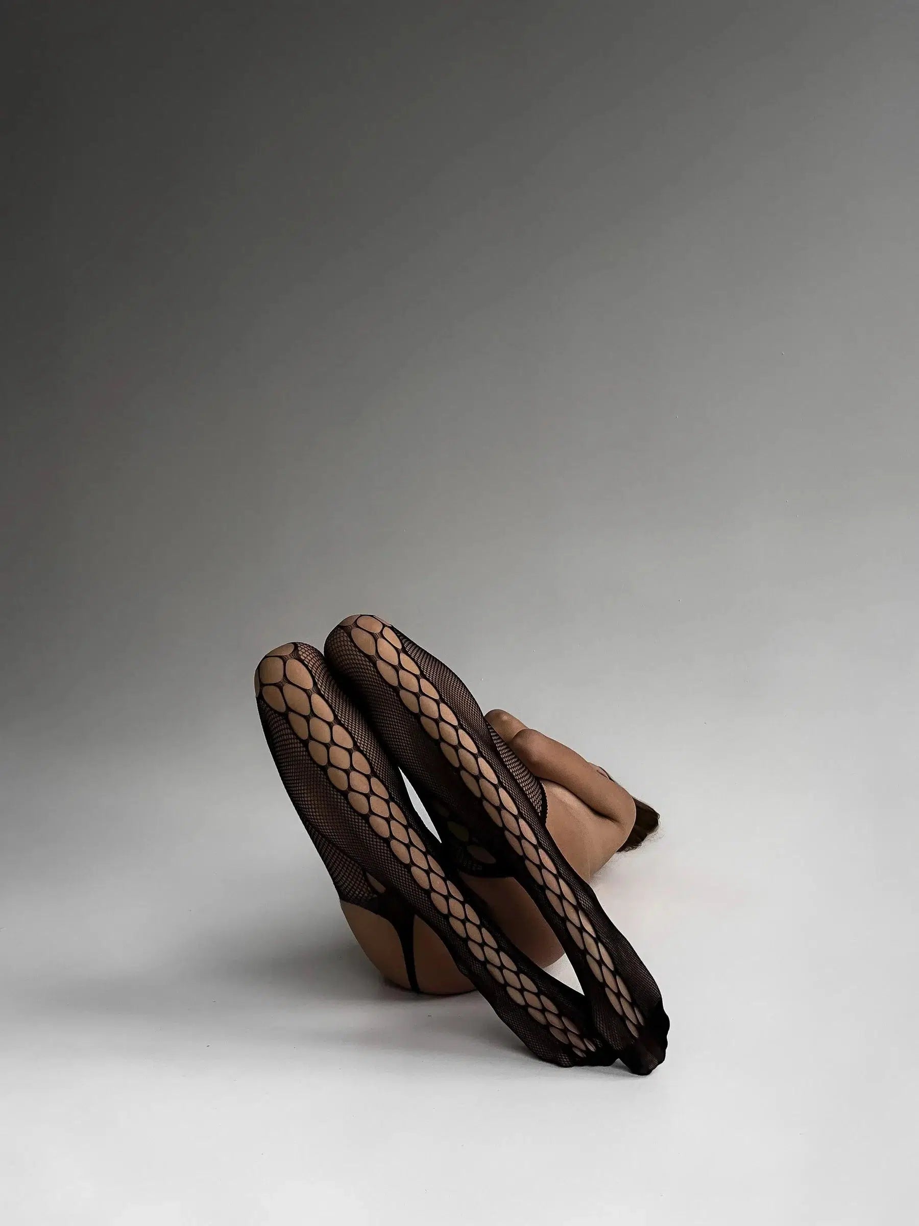 Medias de red de pescado de Ariel Black